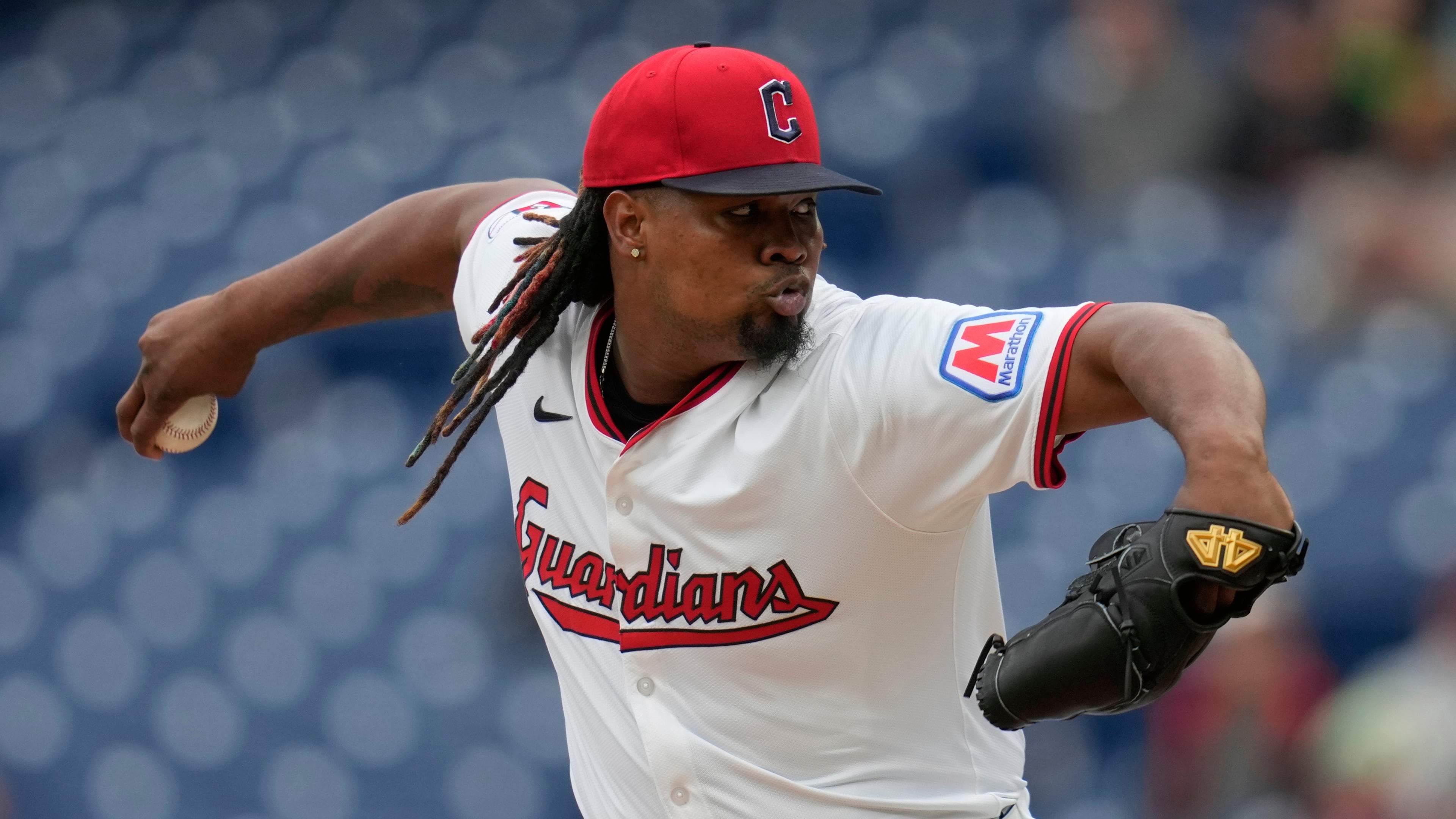 FILE - Cleveland Guardians' Luis Ortiz pitches in the first inning of a baseball game against the Minnesota Twins, in Cleveland, April 30, 2025. (AP Photo/Sue Ogrocki, File)