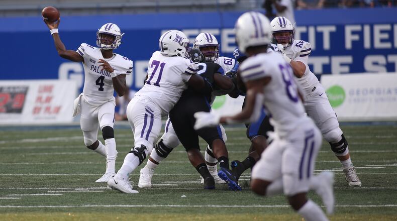 Furman Paladins quarterback Darren Grainger (4) makes a pass during a college football game against Georgia State Panthers at Georgia State Stadium, Saturday, Sept. 7, 2019, in Atlanta. BRANDEN CAMP/SPECIAL