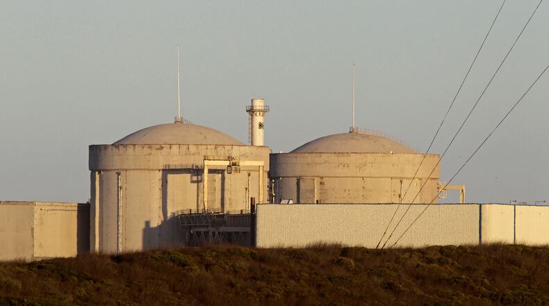 FILE - South Africa's Koeberg nuclear power station on the outskirts of the city of Cape Town, South Africa, Wednesday, Feb. 8, 2012. (AP Photo/Schalk van Zuydam, File)