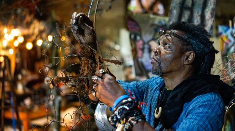 Lonnie Holley, working in his studio in 2018, is the subject of a new documentary by Atlanta filmmaker George King, ”Thumbs Up for Mother Universe: Stories from the Life of Lonnie Holley.”