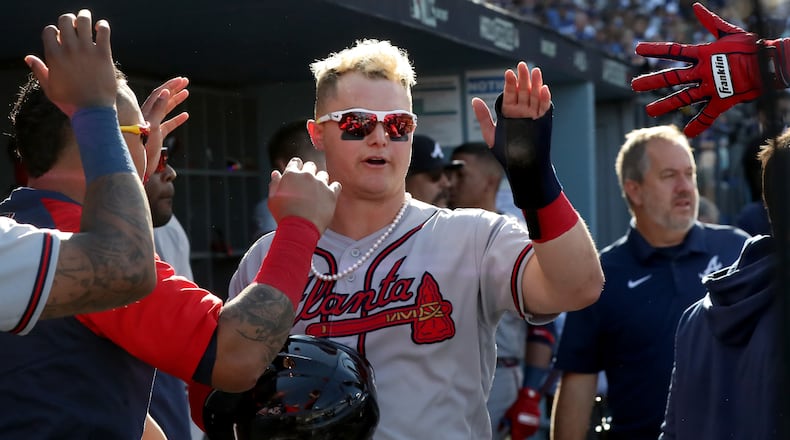 Following the Braves victory parade in Atlanta on Nov. 5, Joc Pederson donated his pearl necklace to the National Baseball Hall of Fame and Museum. (Curtis Compton/ccompton@ajc.com)