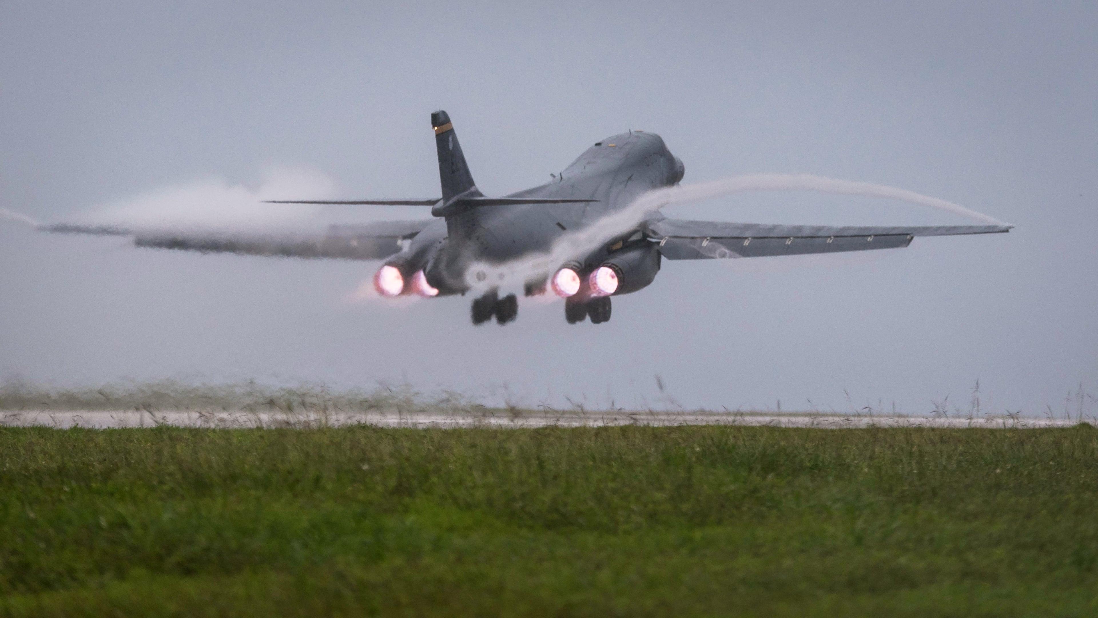 FILE - In this photo released by the U.S. Air Force, a Air Force B-1B Lancer bomber takes off from Andersen Air Force Base, Guam, to fly a mission with two Koku Jieitai (Japan Air Self-Defense Force) F-15s, Sept. 9, 2017. (Senior Airman Jacob Skovo/U.S. Air Force via AP)