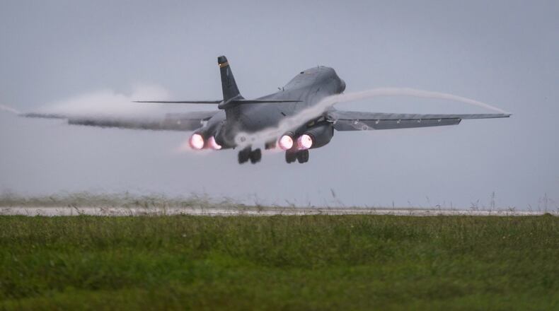 FILE - In this photo released by the U.S. Air Force, a Air Force B-1B Lancer bomber takes off from Andersen Air Force Base, Guam, to fly a mission with two Koku Jieitai (Japan Air Self-Defense Force) F-15s, Sept. 9, 2017. (Senior Airman Jacob Skovo/U.S. Air Force via AP)