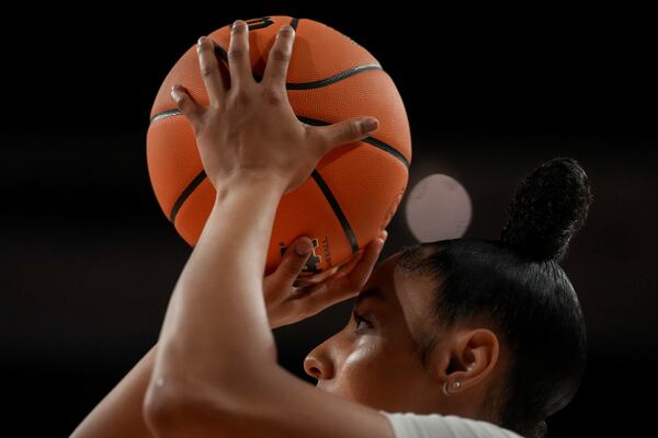 Southern California guard JuJu Watkins warms up before a game against UNC Greensboro during the first round of the NCAA college basketball tournament Saturday, March 22, 2025, in Los Angeles. (AP Photo/Eric Thayer)