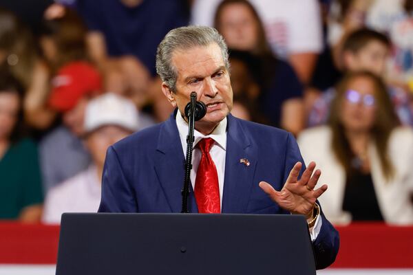 Republican nominee for governor Rick Jackson speaks at President Donald Trump's rally at Wheeler High School in Marietta last week. (Arvin Temkar/AJC)