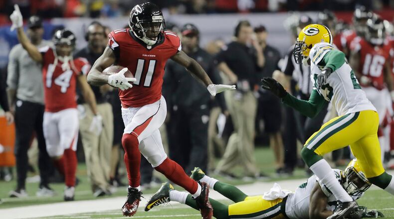 Atlanta Falcons' Julio Jones catches a touchdown pass during the second half of the NFL football NFC championship game against the Green Bay Packers Sunday, Jan. 22, 2017, in Atlanta. (AP Photo/David Goldman)