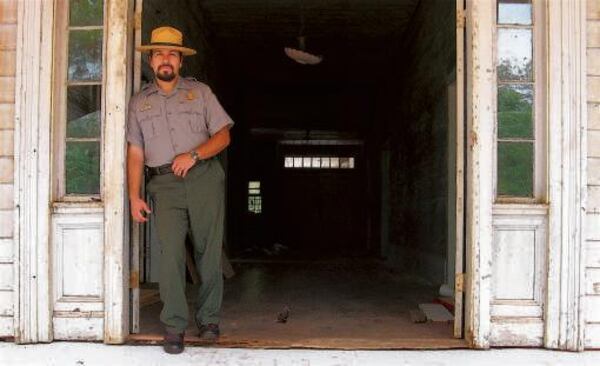 The 'haunted house' of Plains would become part of a proposed Jimmy Carter National HIstorical Park under legislation before Congress. Gary Ingram, superintendent of the national historic site currently in Plains, stands at the door of the home, which the Carters rented years ago. Photos by Mark Davis mrdavis@ajc.com