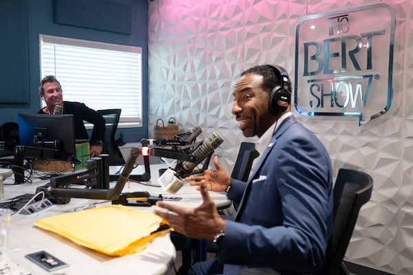 Weiss receives a surprise visit from Atlanta Mayor Andre Dickens while recording a spot for his last radio show on Thursday, Oct. 23, 2025. (Ben Gray for the AJC)
