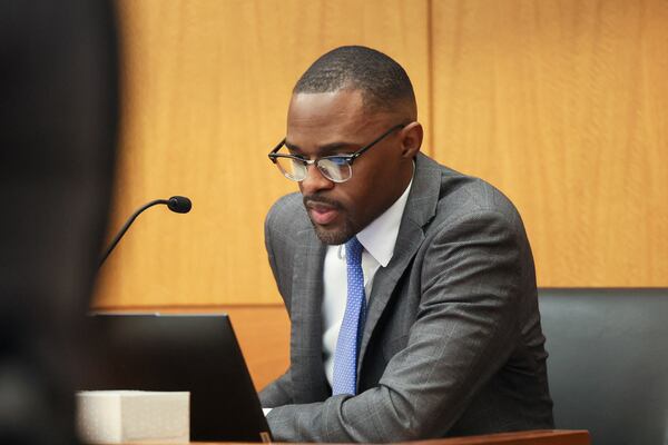 Senior assistant district attorney Dion Peeples argued the “heinousness” of the crimes alleged, along with the fact that Sidney “Starr” Favors lives in Chicago, poses a “significant risk” to her leaving town. (Jason Getz/AJC)
