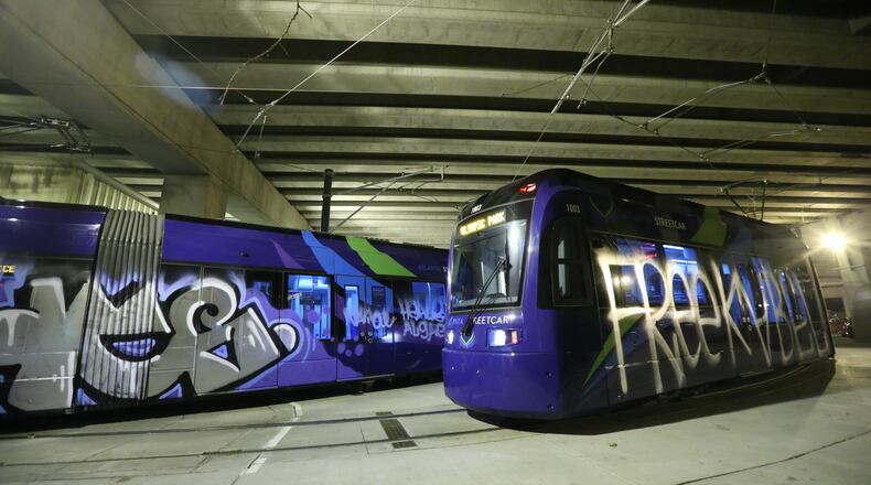 Police Tuesday were working to determine who vandalized several Atlanta streetcars overnight.The streetcars were spray painted with large graffiti while parked for the night at the streetcar maintenance barn under the Downtown Connector near Auburn and Edgewood avenues.The vandalism was reported to authorities about 3:30 a.m. Tuesday, according to Atlanta police dispatchers.