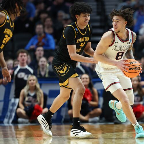 Gonzaga guard Jalen Warley (8) looks to get past Kennesaw State guard Kaden Rickard (4) during the first half in the first round of the NCAA college basketball tournament Thursday, March 19, 2026, in Portland, Ore. (AP Photo/Amanda Loman)