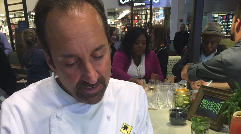 California Pizza Kitchen’s executive chef Brian Sullivan demos a pizza at the chain's flagship Atlanta location in Lenox Mall. Photo: Ana Santos/AJC