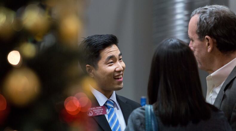 Sam Park, the first openly gay man to be elected to Georgia’s General Assembly, talks with guests earlier this month during a victory party in Atlanta. Branden Camp/Special