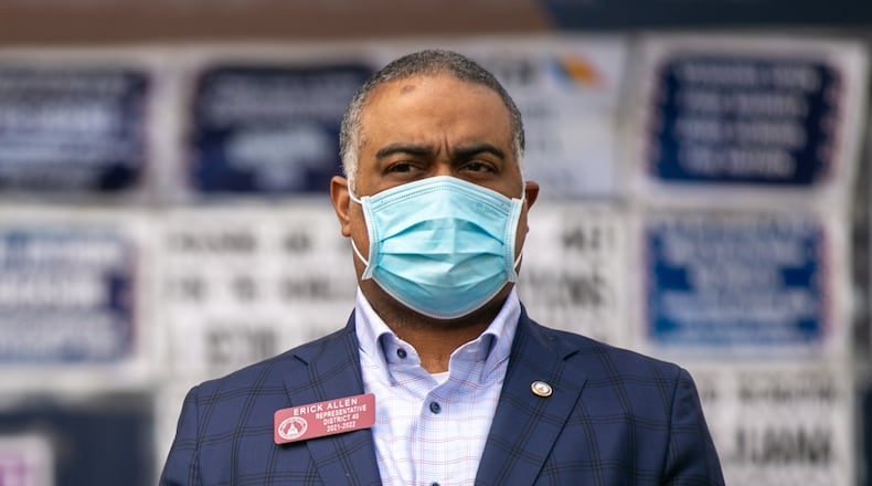 State representative Erick Allen listens at a press conference at the John Lewis mural on Auburn Avenue in downtown Atlanta on Tuesday, January 19, 2021. Democratic Georgia state lawmakers held a press conference at the John Lewis mural on Auburn Avenue to announce the introduction of two bills that would restore the right to vote to felons in Georgia. (Rebecca Wright for the Atlanta Journal-Constitution)