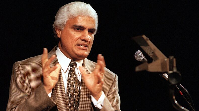 In this file photo, author and lecturer Ravi Zacharias spoke about religious truths to more than 1,400 people in the Center of the Performing Arts in Gainesville, FL. Zacharias challenged skeptics of Christianity by asking 'Can Man Live without God?' (Photo by BRIAN THORPE/The Gainesville Sun)