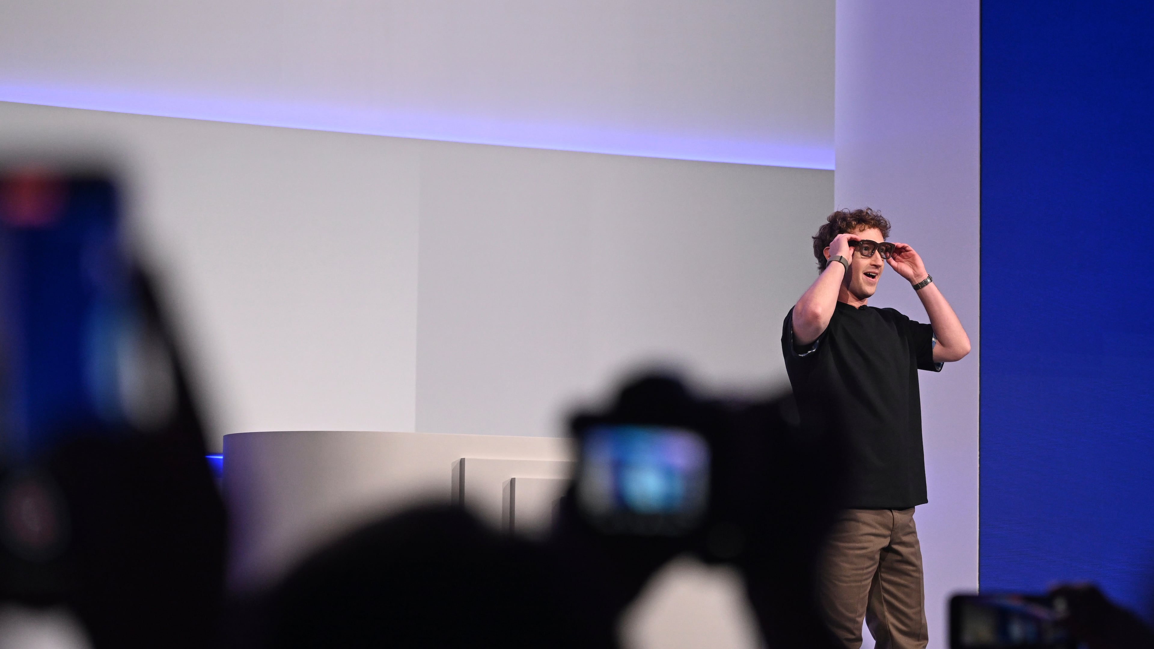 Meta CEO Mark Zuckerberg wears artificial intelligence-powered smart glasses as he speaks during the company's Connect developer conference Wednesday, Sept. 17, 2025, in Menlo Park, Calif. (AP Photo/Nic Coury)