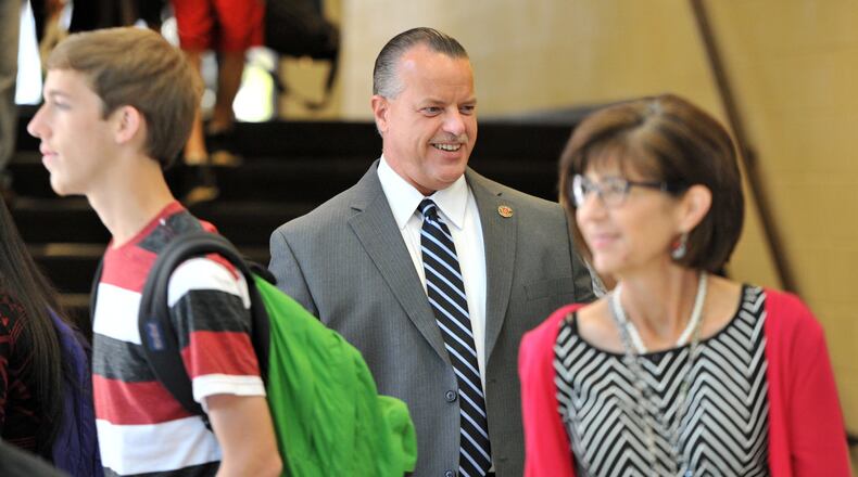 Superintendent Chris Ragsdale (center) meets students and teachers at Wheeler High School in this AJC file photo.