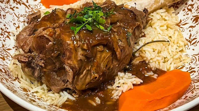A serving of lamb shank was fork-tender at Raik Mediterranean in Suwanee. (Henri Hollis/henri.hollis@ajc.com)