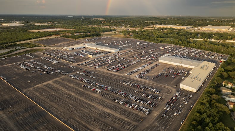 This is a photo of Carvana's ADESA wholesale auction site in Fairburn, which will undergo an expansion to incorporate inspection and reconditioning capabilities. The expansion will involve hiring about 200 new workers.