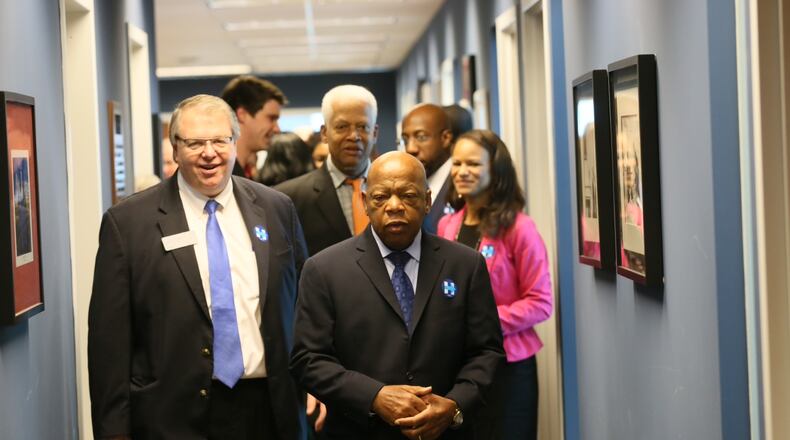 U.S. Rep. John Lewis, front, U.S. Rep. Hank Johnson, center, and Senate Minority Leader Steve Henson, left, prepare for a Democratic Party of Georgia get-out-the-vote effort this weekend. BOB ANDRES / BANDRES@AJC.COM