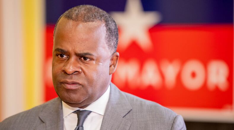 Former mayor Kasim Reed accepts an endorsement from the International Association of Fire Fighters Local 134 at Reed's campaign headquarters on Thursday, Oct. 7, 2021.  (Jenni Girtman for The Atlanta Journal-Constitution)