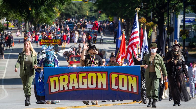 The start of the Dragon Con Parade heads up Peachtree Street on Saturday, September 4, 2021, in Atlanta. STEVE SCHAEFER FOR THE ATLANTA JOURNAL-CONSTITUTION