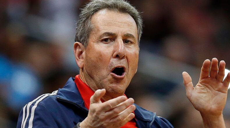 FILE - In this April 26, 2014, file photo, Atlanta Hawks co-owner Bruce Levenson cheers from the stands in the second half of Game 4 of an NBA basketball first-round playoff series against the Indiana Pacers in Atlanta. Levenson said Sunday, Sept. 7, 2014, he is selling his controlling interest in the team, in part due to an inflammatory email he said he wrote in an attempt "to bridge Atlanta's racial sports divide." (AP Photo/John Bazemore, File)