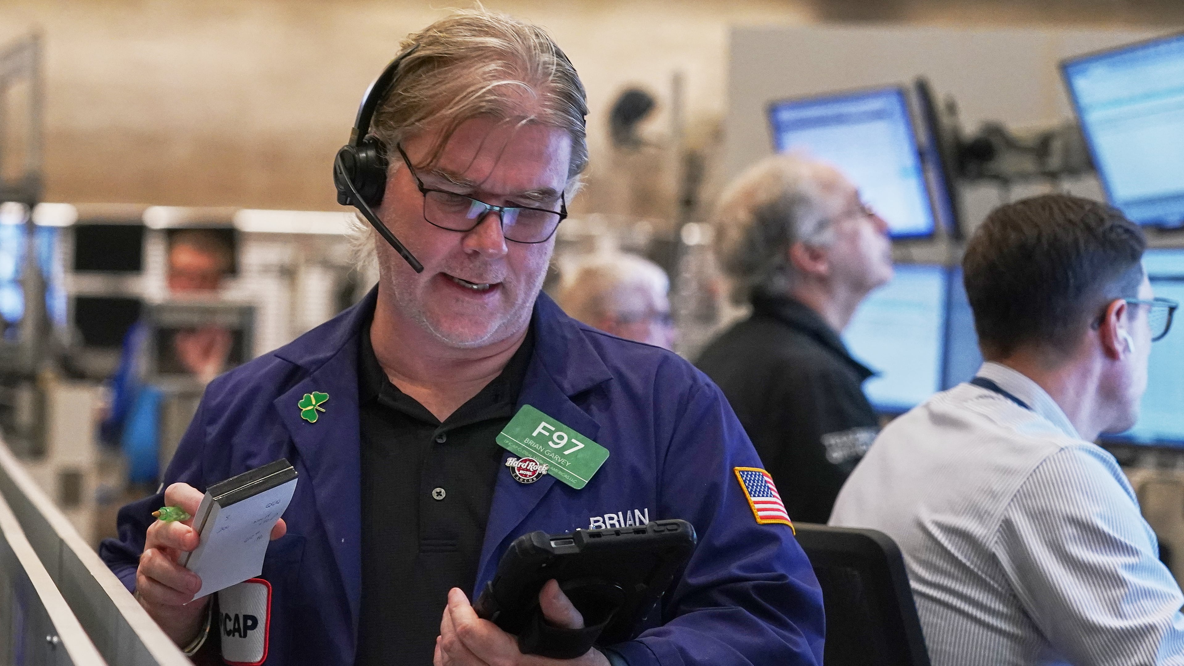 Options trader Brian Garvey works on the floor of the New York Stock Exchange, Thursday, Nov. 6, 2025. (AP Photo/Richard Drew)