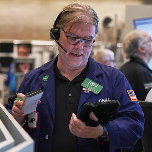 Options trader Brian Garvey works on the floor of the New York Stock Exchange, Thursday, Nov. 6, 2025. (AP Photo/Richard Drew)