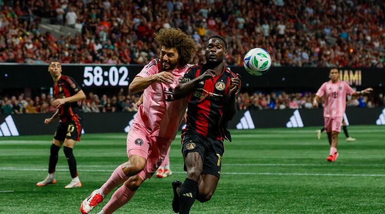 Atlanta United forward Emmanuel Latte Lath (19) battles for possesion against Inter Miami defender Maximiliano Falcón (37) during the second half at Mercedes-Benz Stadium on Sunday, March 16, 2025, in Atlanta.
(Miguel Martinez/ AJC)