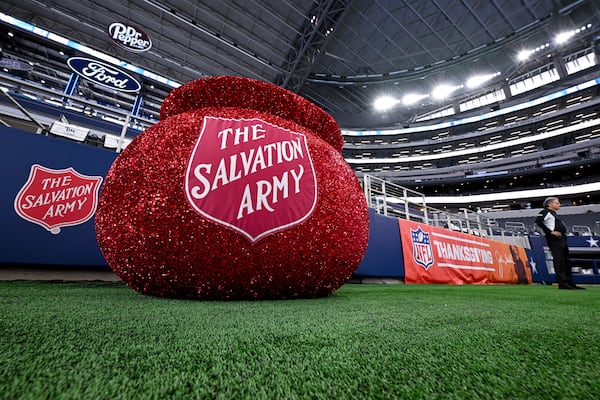 FILE - The Salvation Army bucket as seen on display before an NFL football game between the Dallas Cowboys and the New York Giants in Arlington, Texas, Nov. 28, 2024. (AP Photo/Jerome Miron, File)