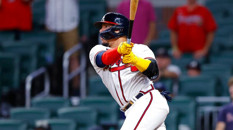 Atlanta Braves William Contreras singles to bring in the winning run in the ninth inning of a baseball game against the Philadelphia Phillies, Tuesday, May 24, 2022, in Atlanta. (AP Photo/Todd Kirkland)