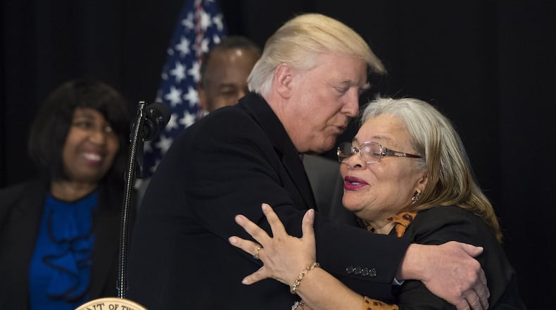 WASHINGTON, DC - FEBRUARY 21: (AFP OUT) President Donald Trump hugs Alveda King, niece of Martin Luther King Jr., as he delivers remarks after touring the Smithsonian National Museum of African American History & Culture on February 21, 2017 in Washington, DC. (Photo by Kevin Dietsch - Pool/Getty Images)