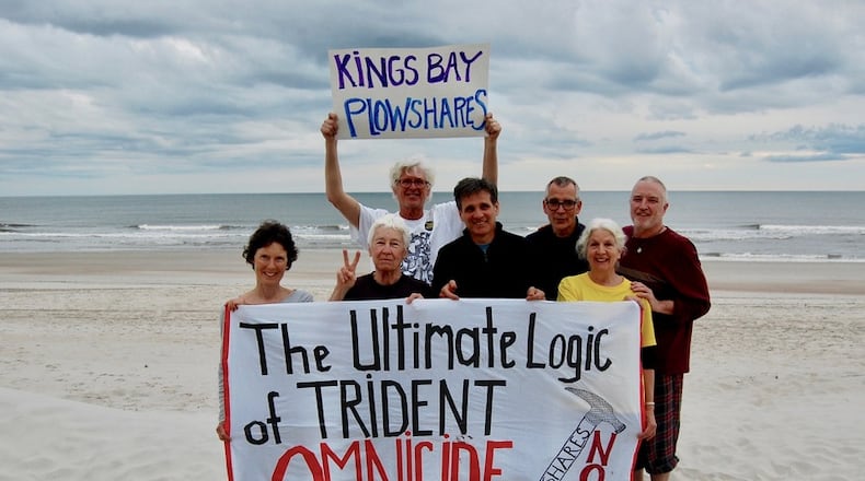 The Kings Bay Plowshares 7, a group of anti-nuclear war Catholic activists, pose for a photo before breaking into the naval base at Kings Bay in South Georgia on April 4, 2018. From left they are: Clare Grady, Elizabeth McAlister, Patrick ONeill, Carmen Trotta, Steve Kelly, Martha Hennessy and Mark Colville. (Courtesy of Kings Bay Plowshares 7)