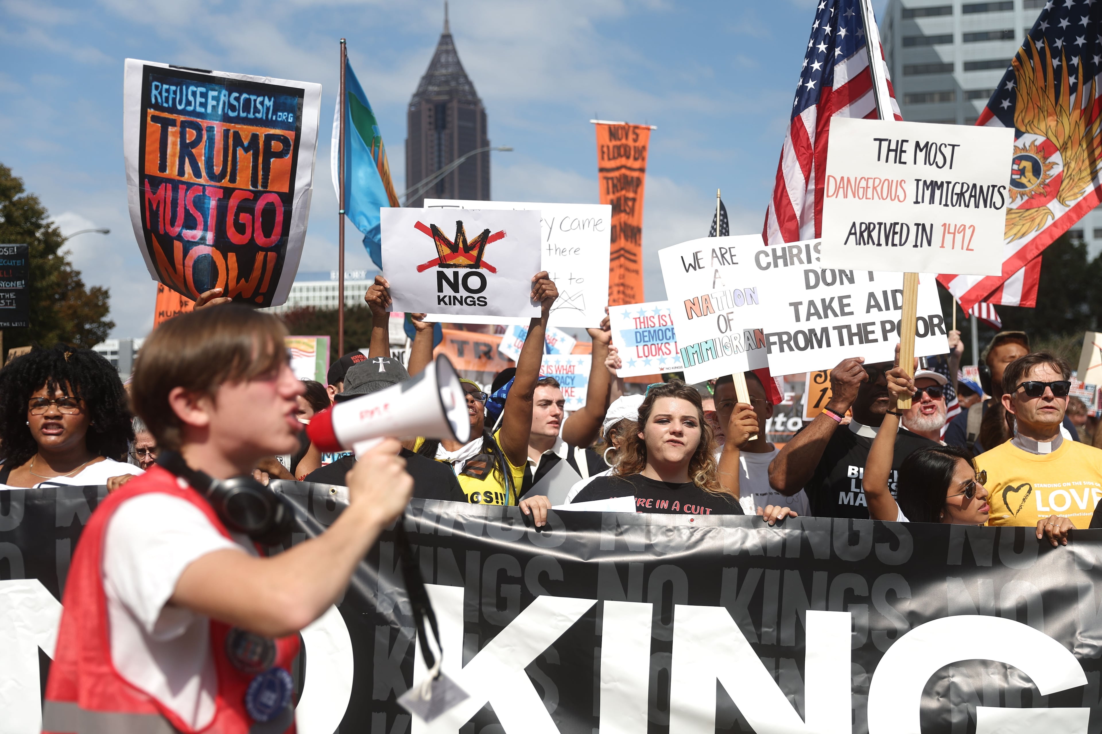 "No Kings" protesters marched down Courtland Street from the Atlanta Civic Center to Liberty Plaza on Saturday. (Abbey Cutrer / AJC)