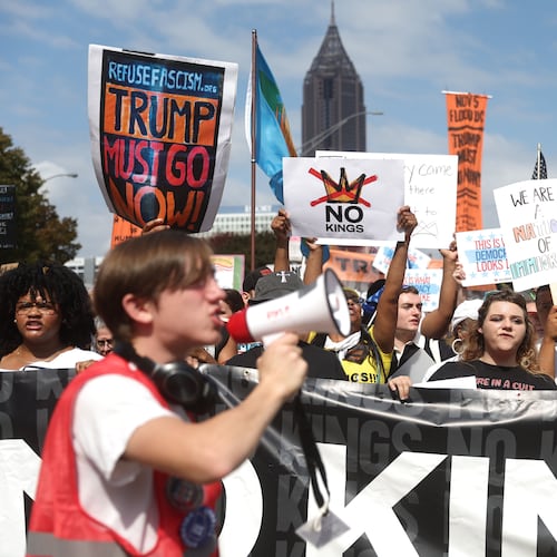 "No Kings" protesters marched down Courtland Street from the Atlanta Civic Center to Liberty Plaza on Saturday. (Abbey Cutrer/AJC)