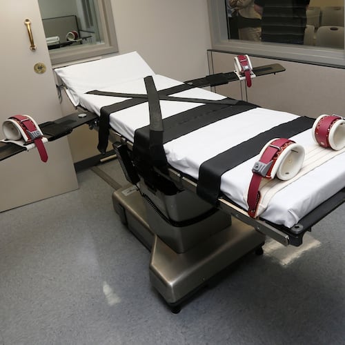 FILE - This Oct. 9, 2014, file photo shows the gurney in the execution chamber at the Oklahoma State Penitentiary in McAlester, Okla. (AP Photo/Sue Ogrocki, File)
