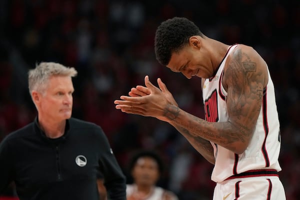 Houston Rockets' Jabari Smith Jr. reacts during the second half of Game 7 of an NBA basketball first-round playoff series against the Golden State Warriors Sunday, May 4, 2025, in Houston. (AP Photo/Ashley Landis)