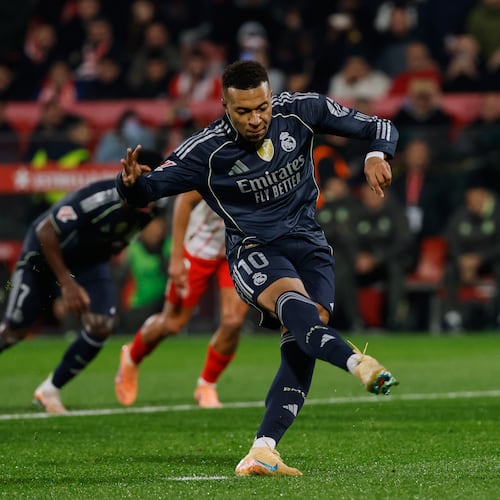 Real Madrid's Kylian Mbappe scores a penalty kick during a Spanish La Liga soccer match between Girona and Real Madrid, in Girona, Spain, Sunday, Nov. 30, 2025. (AP Photo/Joan Monfort)