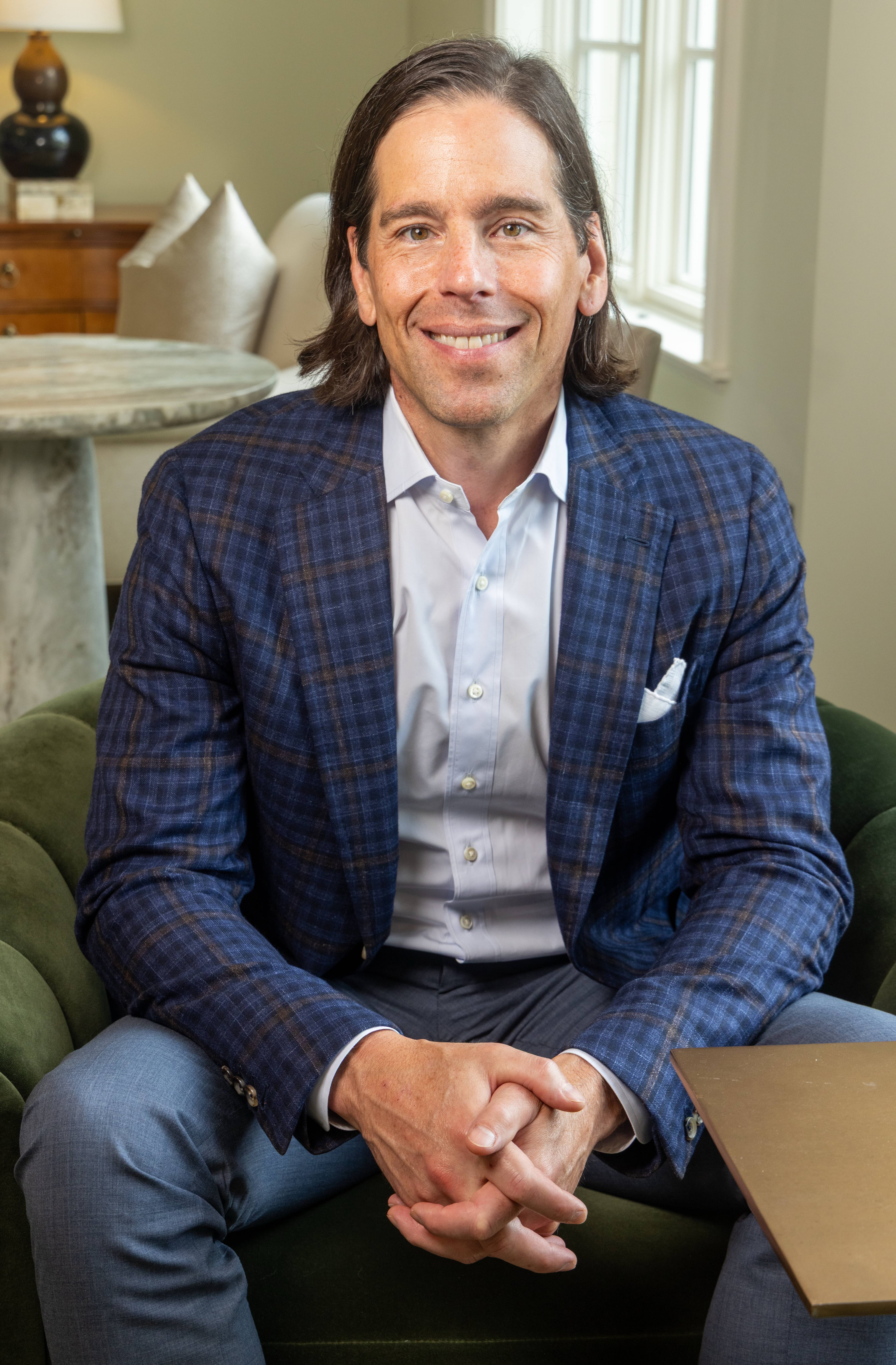 Dorsey Alston Realtors President Michael M. Rogers said, "I know it’s an overused description of office culture as a family environment, but our company culture really is very familial." (Phil Skinner for the AJC)