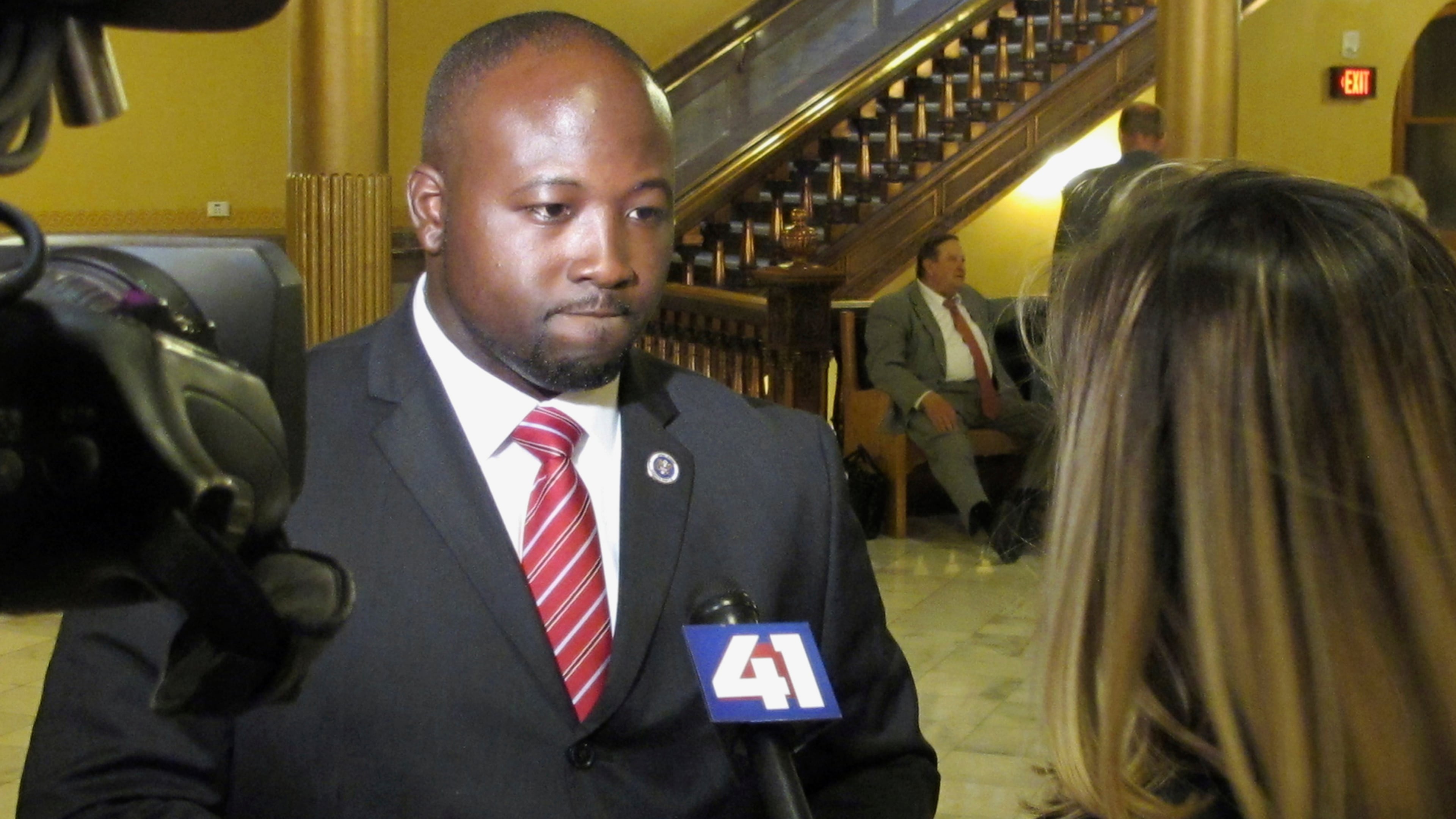 FILE - District Attorney Mark Dupree of Wyandotte County, Kan., answers a television reporter's questions following a Kansas House committee hearing, Tuesday, May 16, 2017, at the Statehouse in Topeka, Kan. (AP Photo/John Hanna, File)