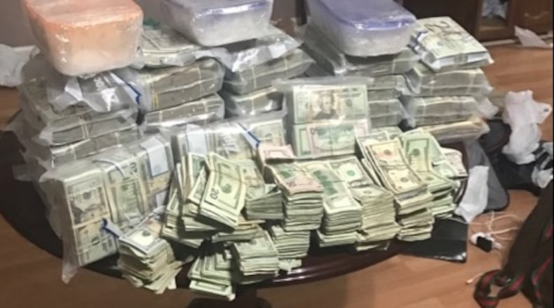 Four hundred pounds of methamphetamine, 175 pounds of cocaine, $2 million in cash and 10 firearms were seized in a DEA operation that resulted in 35 arrests, including 10 Gwinnett County residents.