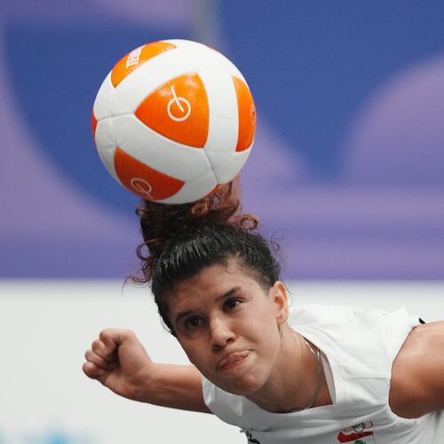 Lebanon's Kamar Dandal controls the ball during the women's singles bronze-medal teqball match against Cambodia's Koemyean Dy at the Asian Games in Nagoya, Japan, Sunday, Sept. 20, 2026. (AP Photo/Lee Jin-man)