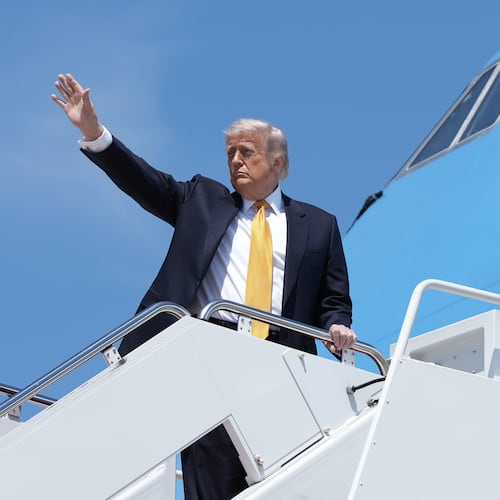 President Donald Trump boards Air Force One Tuesday, May 12, 2026, at Joint Base Andrews, Md., for a trip to China. (AP Photo/Mark Schiefelbein)