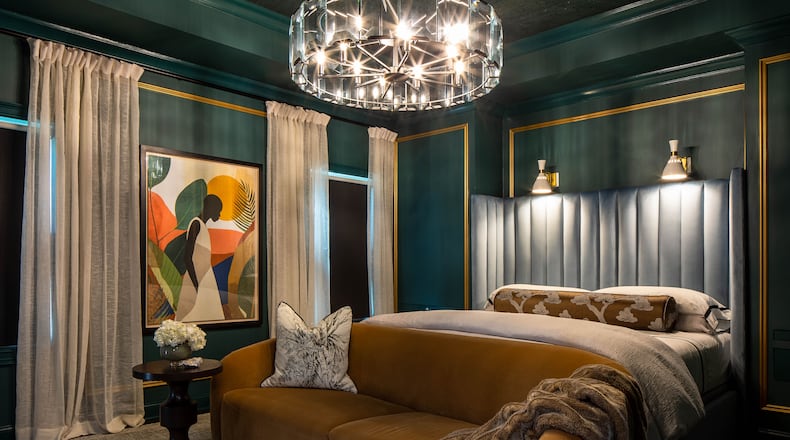 A sophisticated, moody bedroom from the Atlanta design team Forbes+Masters.
(Courtesy of Forbes+Masters)