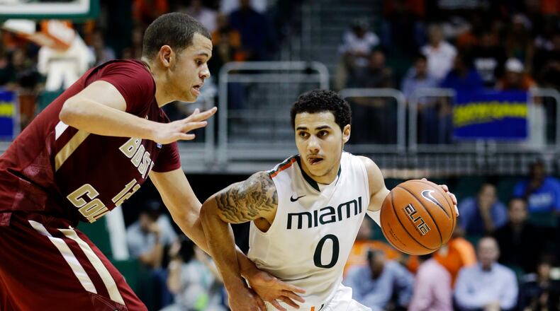 Shane Larkin, son of Reds Hall of Fame shortstop Barry Larkin, driving to the basket for the No. 3 ranked Miami Hurricanes.