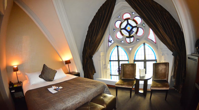 From an early-20th-century caboose in the Finger Lakes of upstate New York to a mid-19th-century Ottoman palace in Istanbul, travelers can stay at the intersection of history and hospitality thanks to the latest trend in the hotel business. In Belgium, for example, Martin’s Patershof occupies a former monastery, complete with stained-glass and grand arches. (Jill Schensul/The Record/TNS)