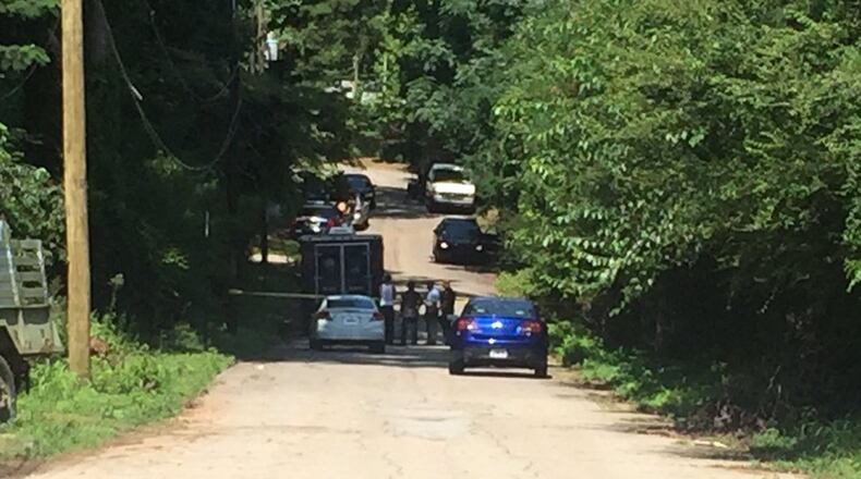 Atlanta police have two people in custody in connection with a series of armed robberies in Midtown. (Credit: Channel 2 Action News)