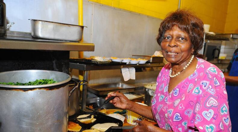 Mama Louise Hudson, original founder of H&H restaurant with her late cousin Inez Hill died Tuesday at the age of 93. File Photo. Mama Louise Hudson makes hoe cakes, pan-fried cornbread cakes at H&H Restaurant in 2013.