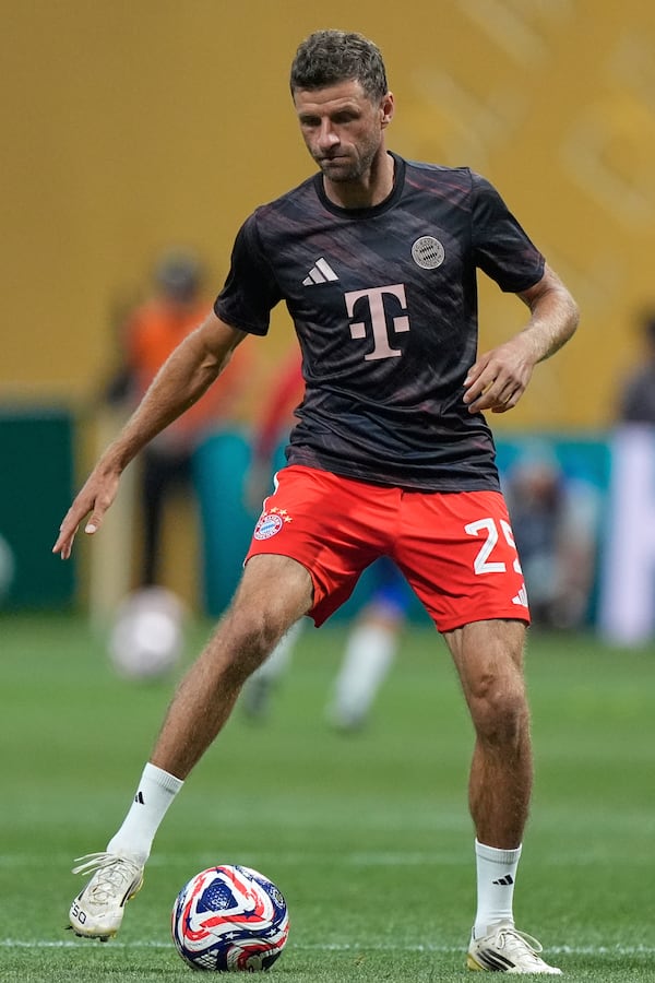Bayern Munich's Thomas Muller warms up before the Club World Cup quarterfinal soccer match between PSG and Bayern Munich in Atlanta, Saturday, July 5, 2025. (AP Photo/Mike Stewart)
